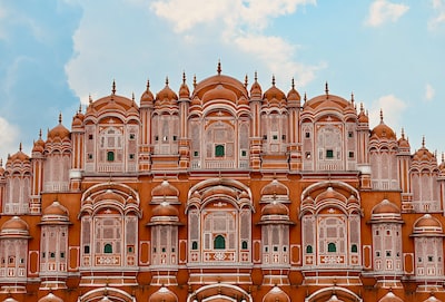 Pink sandstone facade of Hawa Mahal in Jaipur, Rajasthan