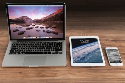 Laptop, tablet and phone side by side for cross-device testing