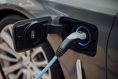 Charging cable plugged into an electric vehicle