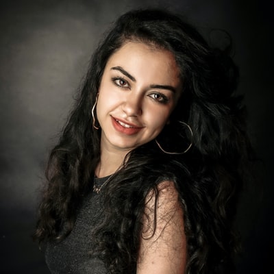 Portrait of a smiling woman with long dark hair